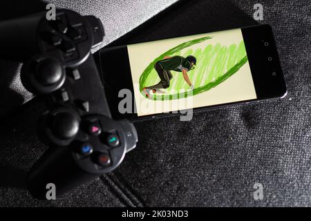 Gamer-Arbeitsraum-Konzept. Gaming-Setup. Draufsicht auf eine Gaming-Ausrüstung, Joystick und ein Smartphone Stockfoto