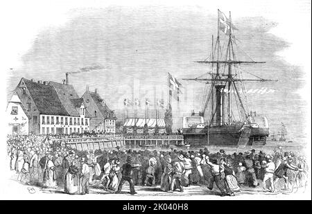 Ankunft des Königs von Dänemark in Flensburg, 1854. Eröffnung der in Großbritannien gebauten Königlich Dänischen Eisenbahn durch Friedrich VII., König von Dänemark. Anwesend waren Samuel Morton Peto, ein Partner der Firma Peto, Brassey und Betts, und der Ingenieur George Parker Bidder. Der König kommt auf dem Cygnus an, der ein Feuerwerk trug, das es den Bewohnern erlaubte, mit einer pyrotechnischen Darstellung begünstigt zu werden, die die Einheimischen sehr erfreut; zwischen ihnen und den Engländern besteht das bestmögliche Gefühl. Dies ist nicht nur der englischen Hauptstadt zu verdanken, die beide durch die Formatio in ihr Land gegossen wurde Stockfoto