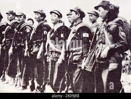 Chinesische kommunistische Soldaten der Roten Armee während des Bürgerkrieges, c1949. Die Rote Armee der chinesischen Arbeiter und Bauern oder die revolutionäre Armee der chinesischen Arbeiter und Bauern, allgemein bekannt als die Rote Armee Chinas oder einfach die Rote Armee, waren von 1928 bis 1937 die Streitkräfte der Kommunistischen Partei Chinas. Stockfoto