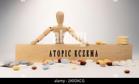 Atopisches Ekzem auf Holzoberfläche geschrieben. Holzmann und Medizin Konzept. Gesundes Leben und Krankheiten Stockfoto