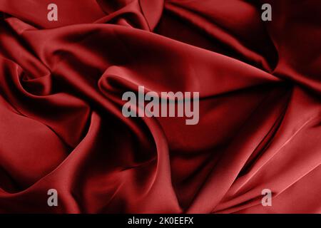Falten aus schwarzem Seidenstoff. Stockfoto