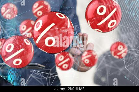 Die Hand eines Mannes zeigt auf 3D gerenderte rote Prozentsymbole Stockfoto