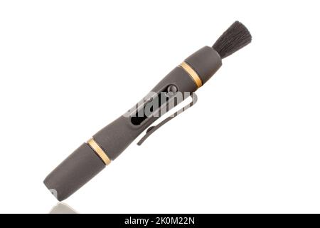 Ein optischer Reinigungsstift, Nahaufnahme, isoliert auf weißem Hintergrund. Stockfoto