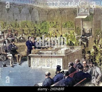 Disraeli redet im Unterhaus, Benjamin Disraeli, 1. Earl of Beaconsfield, (21. Dezember 1804 bis 19. April 1881), ein konservativer britischer Staatsmann und erfolgreicher Romanschriftsteller. Zweimal, 1868 und von 1874 bis 1880, bekannte er das Amt des britischen Premierministers, 1869, England / Disraeli Speaking in the House of Commons, Benjamin Disraeli, 1. Earl of Beaconsfield, (21. Dezember 1804-19. April 1881), ein konservativer britischer Staatsmann und erfolgreicher Schriftsteller. Zweimal, 1868 und von 1874 bis 1880, bekleidete er das Amt des britischen Premierministers, 1869, England, Historisch, Digit Stockfoto