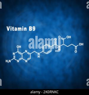 Vitamin B9, Folsäure, strukturelle chemische Formel auf blauem Hintergrund Stockfoto