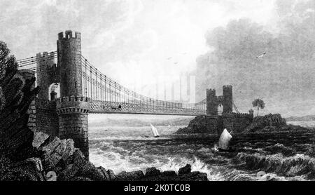 Abbildung der Conway Suspension Bridge, die von Thomas Telford (1757-1834), einem schottischen Bauingenieur, Architekten und Steinmetz, erbaut wurde. Datiert aus dem 19.. Jahrhundert Stockfoto