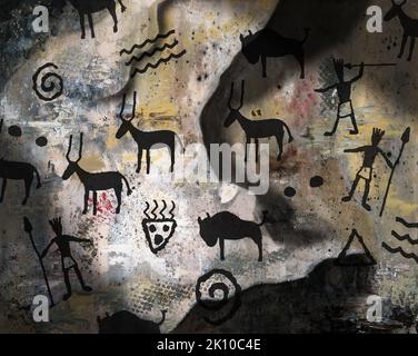 Prähistorische Tiere und Symbole schmücken die Innenwand einer Höhle. Stockfoto