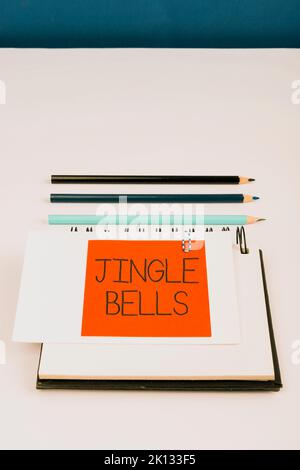 Textschild mit Jingle Bells. Business Showcase berühmtesten traditionellen Weihnachtslied auf der ganzen Welt Stockfoto