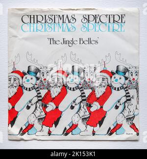 7-Zoll-Vinyl-Cover-Version der Weihnachts-Single Christmas Spectre von The Jingle Belles aus dem Jahr 1983 Stockfoto