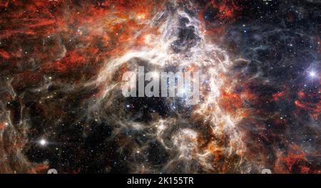 Tarantula-Nebel, 30 Doradus, NGC 2070, Sternentstehungsregion im Tiefraum. Gasansammlungen im Weltraum. James webb-Teleskop. Weltraumlandschaft Stockfoto