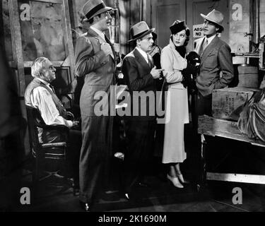 Jack Durant, Frank Mitchell, Bebe Daniels, Thomas Beck, am Set des Films, 'Music is Magic', 20. Century-Fox, 1935 Stockfoto