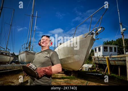 Festsetzung eines Bootes in Holyhead North Wales Stockfoto