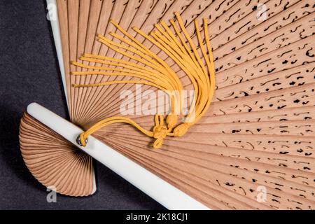 Antiker Holzventilator gleichmäßig verteilt. Stockfoto