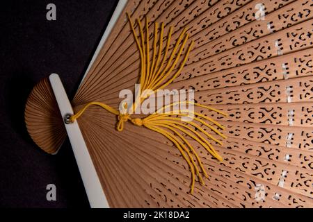 Antiker Holzventilator gleichmäßig verteilt. Stockfoto