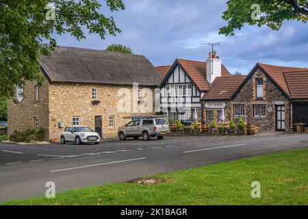 The Border Hotel, Kirk Yetholm, Scottish Borders, Großbritannien. Die das nördliche Ende des Pennine Way Fernwanderwegs markiert Stockfoto