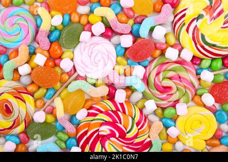 Gemischte Mischung aus verschiedenen Süßigkeiten und Gelees. Bunte Süßigkeiten Stockfoto