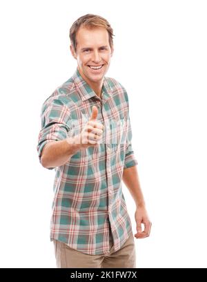 Sie haben meine Zustimmung erhalten. Porträt eines hübschen jungen Mannes, der den Daumen nach oben auf einen weißen Hintergrund stitiert. Stockfoto