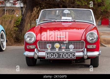 1965 Austin Healey Sprite auf der Marine Parade, Southend on Sea, Essex, Großbritannien. 1970s Oldtimer, bei der Veranstaltung Classic Cars on the Beach Seafront Stockfoto