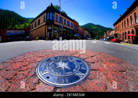 Center of the Universe Marker auf der Straße in Wallace Idaho Stockfoto