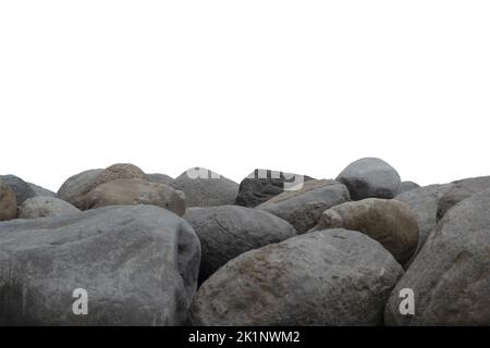 Gestapelte Felsbrocken, weißer Ausschnitt, Kopierraum. Stockfoto