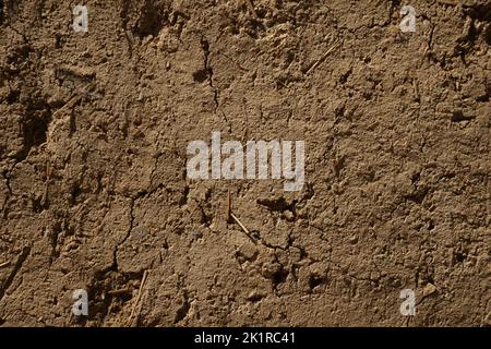 adobe Wand mit Aussparungen, Hintergrund Stockfoto