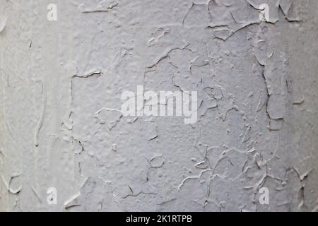Alte graue zerkratzte Wandstruktur für einen Hintergrund Stockfoto
