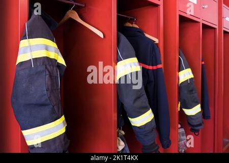 Schweiz, Flughafen Agno-Lugano, Feuerwehr, Feuerwehrkleidung Stockfoto