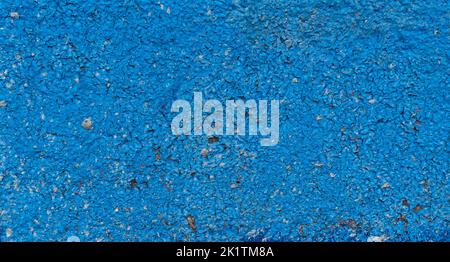 Blauer psychedelischer abstrakter Hintergrund. Farbflocken auf Betonwand