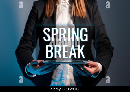 Schild mit Frühlingsferien. Konzept Bedeutung Urlaub in der Schule und an den Universitäten im Frühjahr Stockfoto