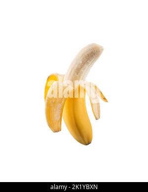 Eine halbe geschälte ganze Banane. Stockfoto