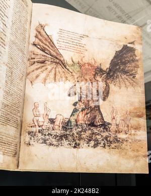 FLORENZ, ITALIEN - circa Juli 2021. Antikes Manuskriptblatt aus einem gotischen Buch mit satanischer Höllenillustration, Kopie aus dem 16th. Jahrhundert. Stockfoto