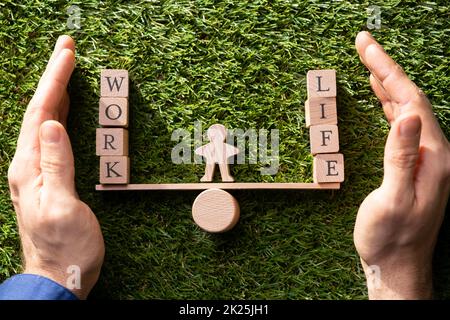 Work-Life-Balance-Wahl Stockfoto