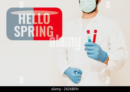 Textzeichen mit „Hello Spring“. Ein Wort für die Begrüßung der Saison nach der Winterblüte der Blumen Forschungswissenschaftler vergleicht verschiedene Proben, Doktor Displaying Cure Stockfoto