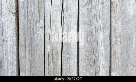 Grunge Plank Holz Textur Hintergrund. Nahaufnahme der grauen Holzzaunplatten Stockfoto