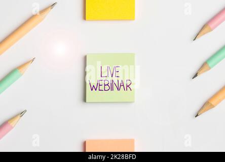 Handschriftliches Schild Live Webinar. Vorlesung oder Seminar zur konzeptionellen Fotopräsentation, übertragen über Web Flash School Office Supplies, Bright Teaching Learning Collections Stockfoto