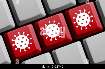 Coronavirus-Symbole auf roter Computertastatur 3D Abbildung Stockfoto