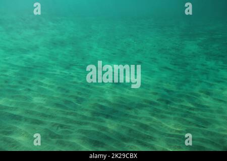 Meeresgrund, kleine "unes" in Sand leuchtet die Sonne scheint von oben. Abstrakte marine Hintergrund. Stockfoto