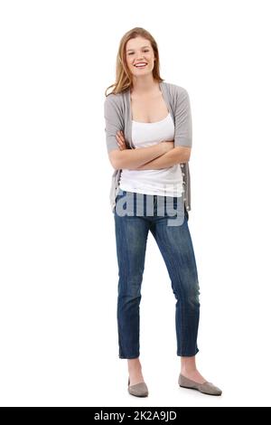 Positiv überzeugt. Studioporträt einer attraktiven jungen Frau, die mit ihren Armen isoliert auf Weiß stehend. Stockfoto