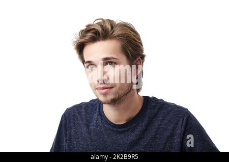 Cool und lässig. Kurze Studioaufnahme eines hübschen jungen Mannes in einem T-Shirt. Stockfoto