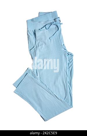 Jogginghosen isoliert. Nahaufnahme von Frauen modische blaue Freizeithose oder Jersey-Hose isoliert auf weißem Hintergrund. Jogging-Outfit fürs Workout. Beschneidungspfad. Stockfoto