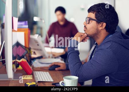 Die IT-Experten. Aufnahme von Mitarbeitern in einem IT-Büro. Stockfoto