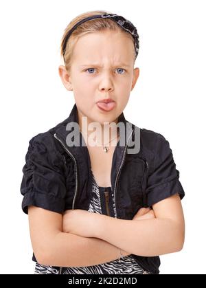 Shes ein stilvolles junges Mädchen - Kindermode. Ein junges Mädchen posiert im Studio. Stockfoto