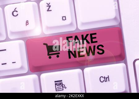 Konzeptunterschrift Fake News. Ein Wort, das auf falschen Informationen geschrieben wurde, wird unter dem Deckmantel authentischer Nachrichten veröffentlicht Abstract präsentiert ethischen Hacker, schreibt kreative Notizen und Ideen Stockfoto