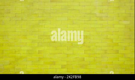 Alte gelbe Ziegel Wand Textur Hintergrund Stockfoto