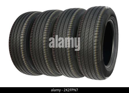 Vier Sommerreifen für Auto isoliert auf weiß. Stockfoto