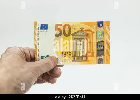 Männlicher Zeiger mit 50-Euro-Schein Stockfoto