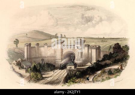 Primrose Hill Tunnel bei London, an der London und Birmingham Railway, eröffnet 1838. Ingenieur Robert Stephenson (1803-1859) der 3/4-Meilen-Tunnel, der durch schwierigen Londoner Lehm gebaut wurde, kostete 240.000 £. Das Portal kostete 7.000 £. Das Bild zeigt elementare, signalerweise von Glocken, Polizisten mit Flagge und früh rotierende Scheibe auf einem Standard. Aus „The British Gazeteer“ (London, 1852). Gravur. Stockfoto