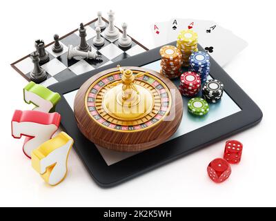 Tablet-Computer, Spielkarten, Roulette, Chips, Würfel. Stockfoto