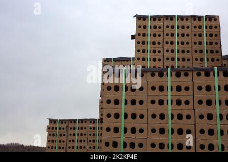 Backstein Haufenstruktur Hintergrund viele Steinhaufen auf der Baustelle Stockfoto