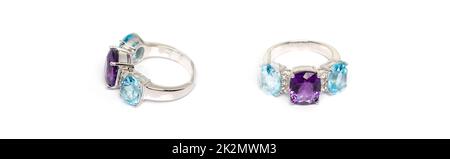 Amethyst mit blauem Topas und weißem Saphir Ring mit Edelsteinen oder Edelsteinen auf weißem Hintergrund. Kollektion von natürlichen Edelsteinen Accessoires. Studioaufnahme Stockfoto